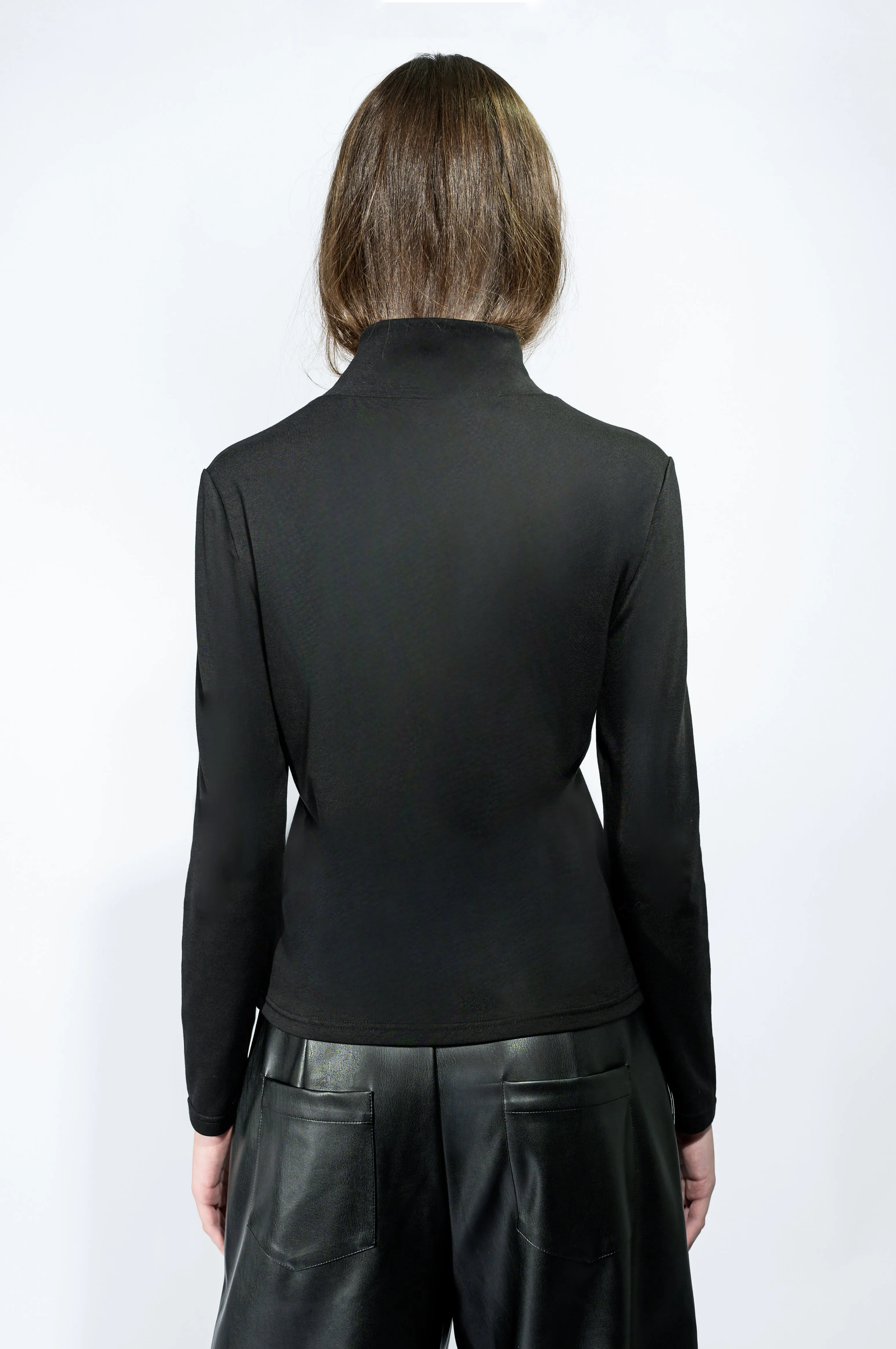 The Cross Turtleneck Top in Black