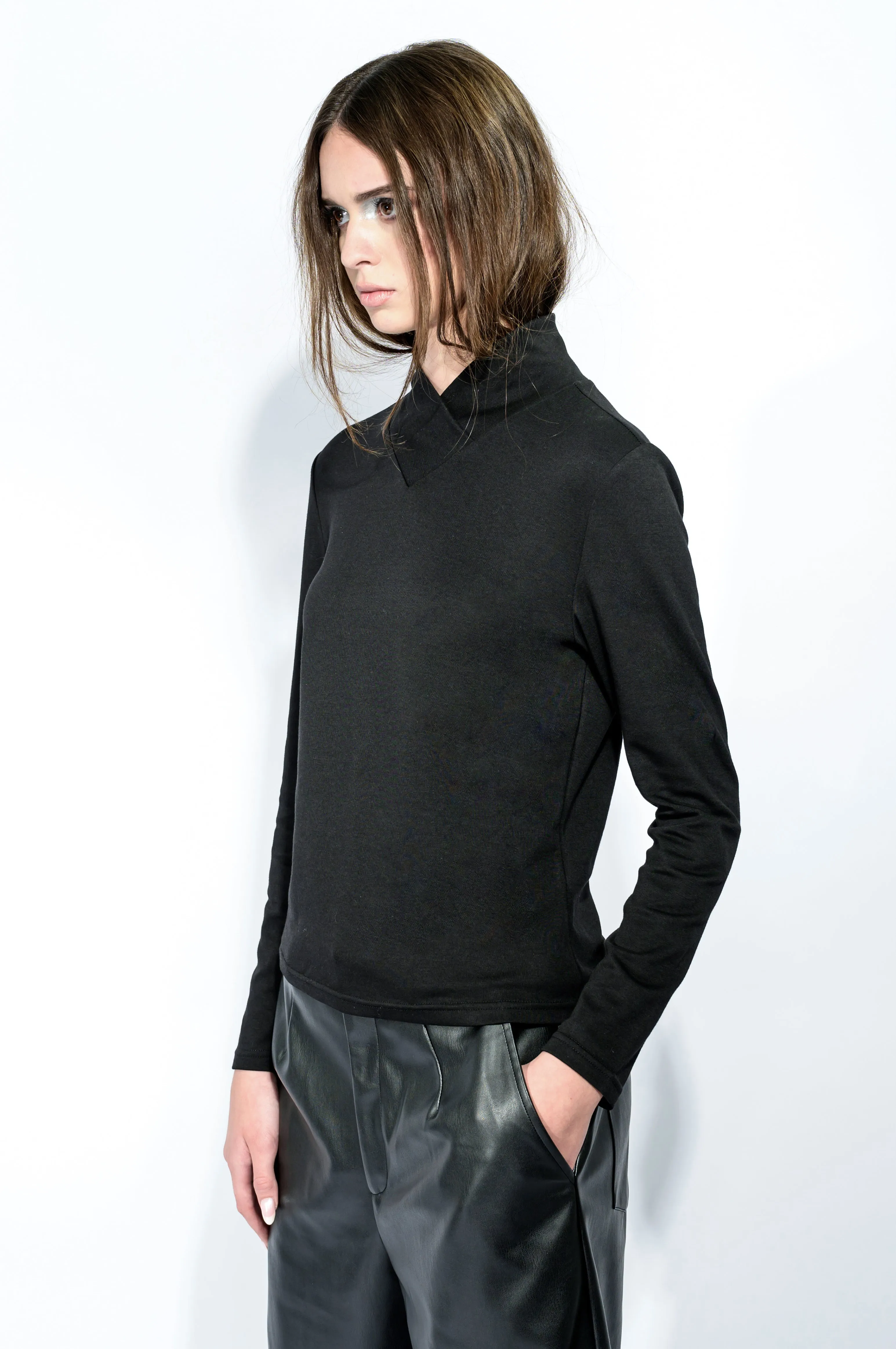 The Cross Turtleneck Top in Black