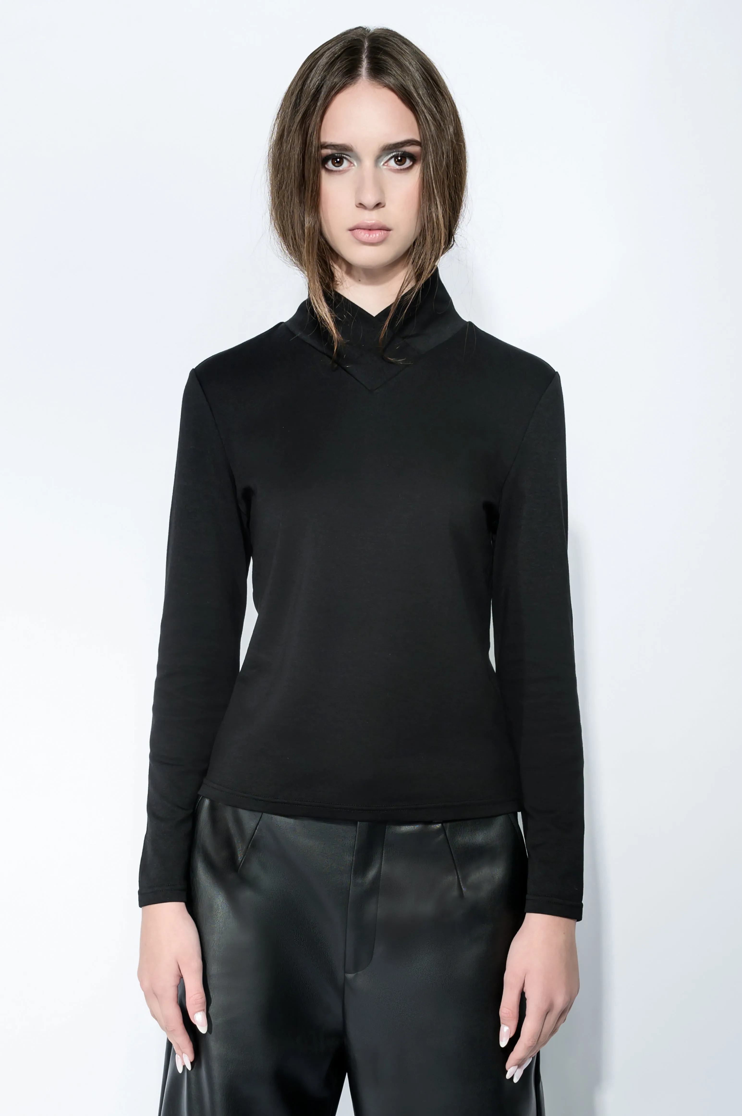 The Cross Turtleneck Top in Black